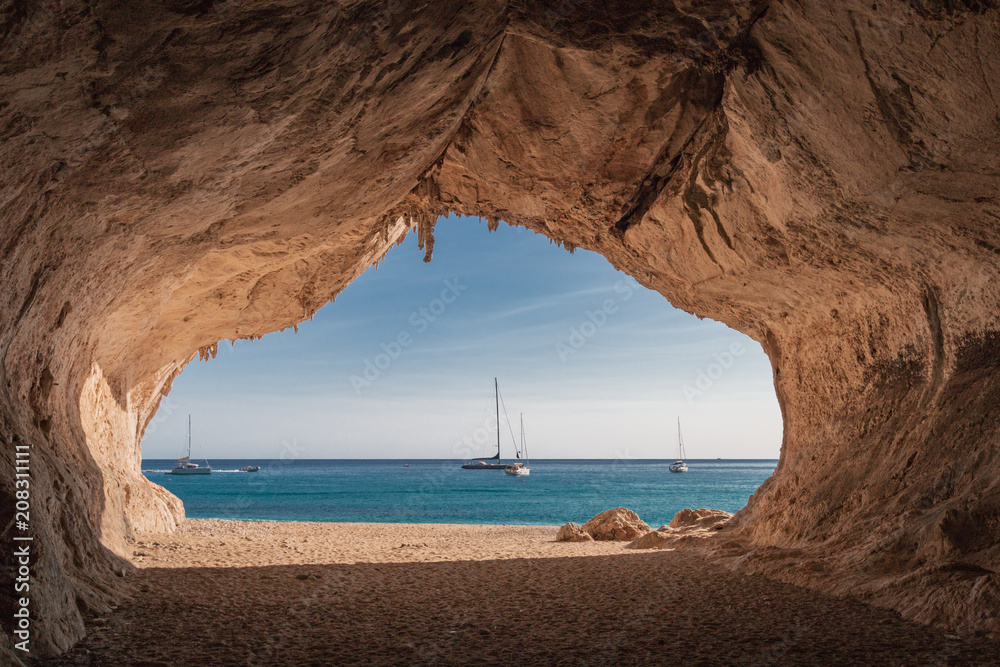 Inside a cave at Cala Luna beach
